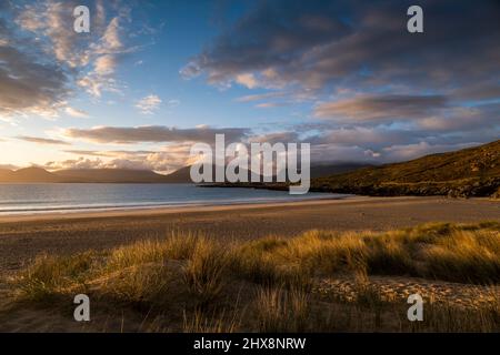 Not a soul in sight as aquamarine waters lap against this perfect sandy beach. Stock Photo