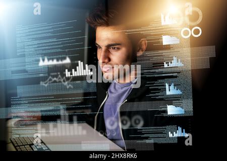 Working on some new code. Cropped shot of a handsome young male computer programmer working on new code. Stock Photo
