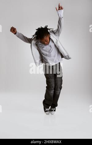 Mr. Hip Hop. A young boy hip-hop dancing in the studio. Stock Photo