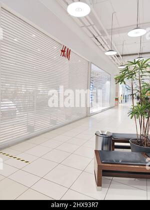 Moscow, Russia, March 2022: HM store suspends work in Russia. The shops are closed. Vertical image. Stock Photo