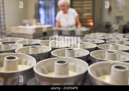 Many cake pans in a large bakery for the production of Gugelhupf cakes Stock Photo