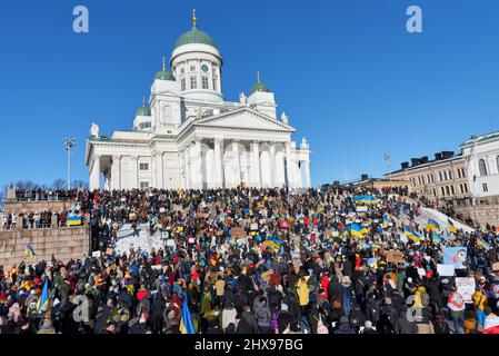 Helsinki, Finland - February 26, 2022: Thousands of demonstrators in a rally against Russia’s military aggression and occupation at Senate Square in d Stock Photo