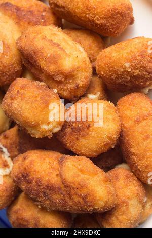 Close-up of fried croquettes texture. Background and food. Stock Photo