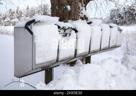 Snow covered mailboxes after heavy snowfall in Helsinki, Finland Stock Photo