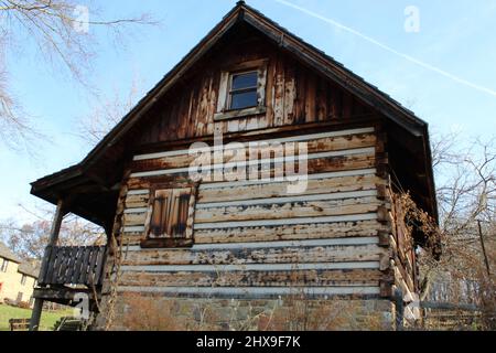 Weathered log cabin side wall Stock Photo