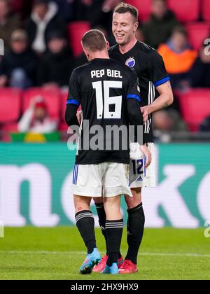 Eindhoven, Netherlands. 10th Mar, 2022. EINDHOVEN, NETHERLANDS - MARCH 10: Lukas Lerager of F.C. Copenhagen celebrates with Pep Biel of F.C. Copenhagen after scoring his sides third goal during the UEFA Conference League Round of 16 Leg One match between PSV Eindhoven and F.C. Copenhagen at the PSV Stadion on March 10, 2022 in Eindhoven, Netherlands (Photo by Patrick Goosen/Orange Pictures) Credit: Orange Pics BV/Alamy Live News Stock Photo