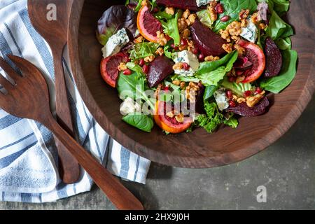 Mixed Green Salad in Wood Bowl Stock Photo