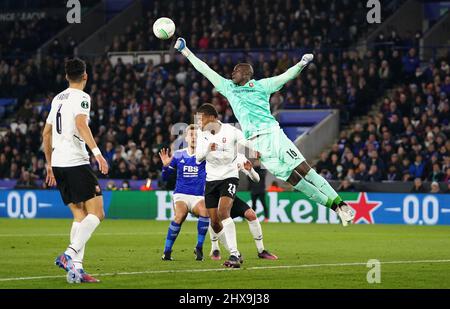 Rennes goalkeeper Alfred Gomis makes a save during the UEFA Europa Conference League round of sixteen first leg match at the King Power Stadium, Leicester. Picture date: Thursday March 10, 2022. Stock Photo