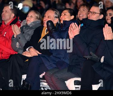 STOCKHOLM 20220310 Crown Princess Victoria and Prince Daniel and Jan Eliasson (next to Victoria), former Deputy Secretary-General of the United Nations,  attend the charity gala 'Sverige samlas och hjälper' ('Sweden get together to help') which was televised from Kungstradgarden park in Stockholm on Thursday night. The music gala collected funds for people afflicted by the war in Ukraine.  Foto: Henrik Montgomery / TT / kod 10060 Stock Photo