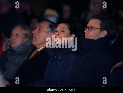 STOCKHOLM 20220310 Crown Princess Victoria and Prince Daniel and Jan Eliasson (L), former Deputy Secretary-General of the United Nations,  attend the charity gala 'Sverige samlas och hjälper' ('Sweden get together to help') which was televised from Kungstradgarden park in Stockholm on Thursday night. The music gala collected funds for people afflicted by the war in Ukraine.  Foto: Henrik Montgomery / TT / kod 10060 Stock Photo