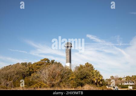 Sullivans Island, South Carolina, USA - February 17, 2022 :  Tourists at Sullivans Island Lighthouse, South Carolina. Stock Photo