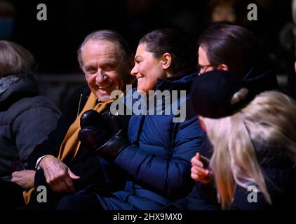 STOCKHOLM 20220310 Crown Princess Victoria and Prince Daniel and Jan Eliasson (next to Victoria), former Deputy Secretary-General of the United Nations,  attend the charity gala 'Sverige samlas och hjälper' ('Sweden get together to help') which was televised from Kungstradgarden park in Stockholm on Thursday night. The music gala collected funds for people afflicted by the war in Ukraine.  Foto: Henrik Montgomery / TT / kod 10060 Stock Photo