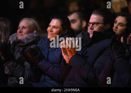 STOCKHOLM 20220310 Crown Princess Victoria and Prince Daniel and Jan Eliasson (next to Victoria), former Deputy Secretary-General of the United Nations,  attend the charity gala 'Sverige samlas och hjälper' ('Sweden get together to help') which was televised from Kungstradgarden park in Stockholm on Thursday night. The music gala collected funds for people afflicted by the war in Ukraine.  Foto: Henrik Montgomery / TT / kod 10060 Stock Photo