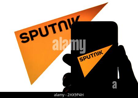 Spain. 9th Mar, 2022. In this photo illustration a Sputnik logo seen displayed on a smartphone with a Sputnik logo in the background. (Credit Image: © Thiago Prudencio/SOPA Images via ZUMA Press Wire) Stock Photo