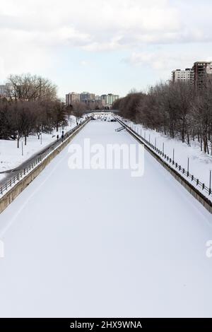 Ottawa, Canada - February 27, 2022: Rideau Canal in winter season in downtown of the city Stock Photo