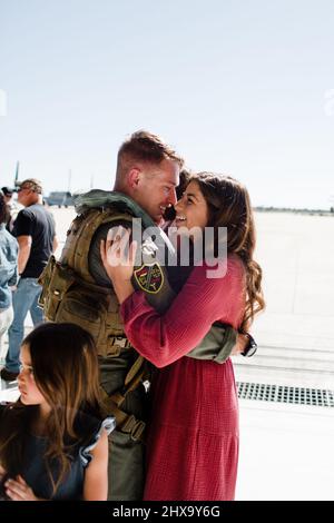 Husband Greeting Wife at Military Homecoming in San Diego Stock Photo