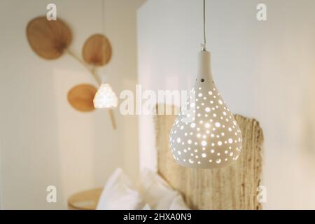 Indoor lighting with hanging lamp in modern style Stock Photo