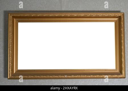 Mockup. An empty picture frame is hanging on the wall Stock Photo
