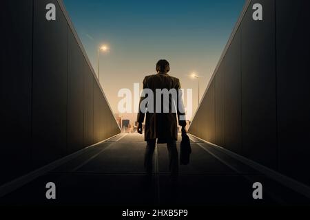 View of urban tunnel with man exit. Escape concept. Stock Photo