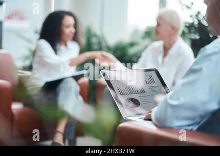 business man checking financial data during a business meeting . Stock Photo