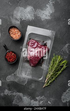 Beef rump steak pack set, on black dark stone table background, top ...