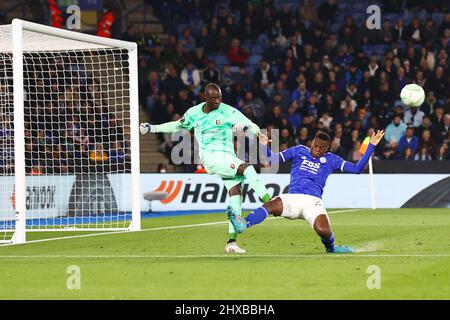 Leicester, UK. 10th Mar, 2022. Rennes Goalkeeper Alfred Gomis (16) just clears ahead of Leicester City Forward Patson Daka (29) during the UEFA Conference League, Round of 16, 1st leg football match between Leicester City and Stade Rennais (Rennes) on March 10, 2022 at King Power Stadium in Leicester, England - Photo: John Mallett/DPPI/LiveMedia Credit: Independent Photo Agency/Alamy Live News Stock Photo