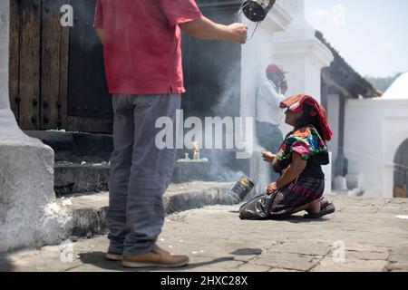 Religious ceremony at the colorful weekly Chichicastenango Mayan Market in Guatemala, Central America. Stock Photo