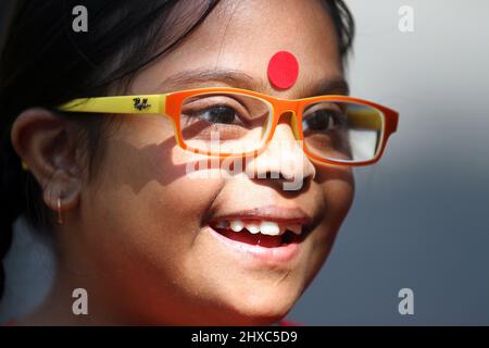Dhaka, Bangladesh - March 21, 2015: Down syndrome girl in Dhaka, Bangladesh. Stock Photo