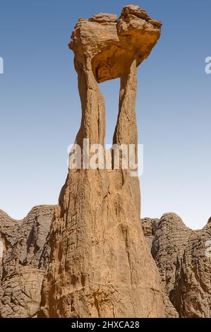 Unique shape of weathered Hoggar rocks in the Sahara desert Stock Photo