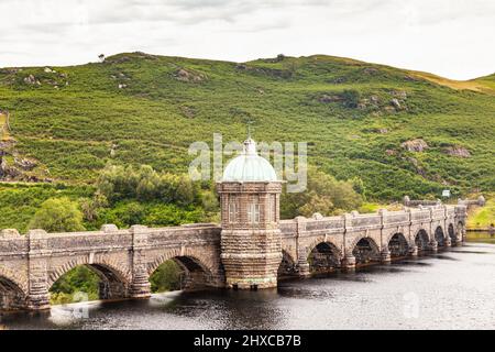 Craig Goch dam reservoir aquaduct and valve tower Elan Valley Powys Wales UK Stock Photo