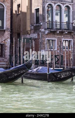 Detail shot of a gondola in front of a palazzo in Venice Stock Photo