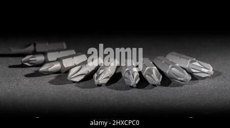 Set of screwdriver bits in dark ambiance Stock Photo