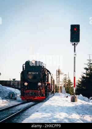 steam locomotive in the Harz mountains on the Brocken during winter Stock Photo