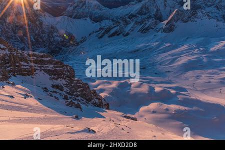 Morning mood on the Zugspitze, sunrise on Germany's highest mountain 'Top of Germany'. Landscape photography. Sonnalpin, ski resort Zugspitze. Stock Photo