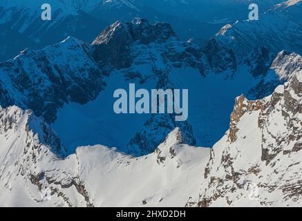 Morning mood on Zugspitze, sunrise on Germany's highest mountain 'Top of Germany'. Landscape photography, weather wall corner. Stock Photo