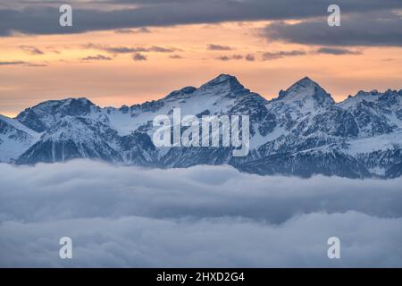 Sand in Taufers, Province of Bolzano, South Tyrol, Italy. Sunrise at the top of Sonnklar with view over the Pustertal valley to the Dolomites. Stock Photo