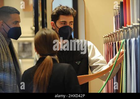 Milan, . 11th Mar, 2022. Milan, 11-03-2022 Tommaso Zorzi with a friend goes to the 'Hermes' boutique in via Montenapoleone to buy a tie to give as a gift. His friend who accompanies him helps him in his choice, then when they leave they walk home. Credit: Independent Photo Agency/Alamy Live News Stock Photo