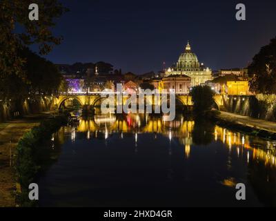 View over Tiber river with Castel Sant'Angelo and St. Peter's Basilica, Rome Stock Photo