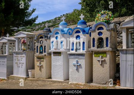 Theologos, Thassos, Greece - Greek Orthodox cemetery with traditional small prayer chapels in the mountain village of Theologos on the island of Thassos. The mountain village Theologos is a popular destination for vacationers. Thassos belongs to Eastern Macedonia and Thrace, also Eastern Macedonia and Thrace. Stock Photo