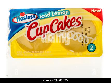 Winneconne, WI -6 March 2021: A package of Hostess iced lemon cupcakes on an isolated background Stock Photo