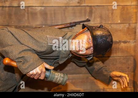 England, Dorset, Bovington Camp, The Tank Museum, Display of WWI Soldier Holding Hand Grenade Stock Photo