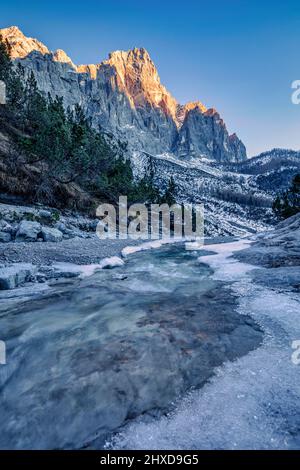 Europe, Italy, Veneto, province of Belluno, Taibon Agordino, small stream in Corpassa valley, in the background the Moiazza montain, Civetta group, Dolomites Stock Photo