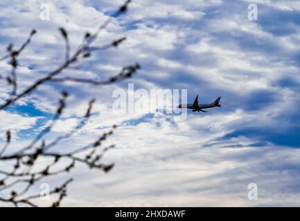 Airplane approaching its destination Stock Photo
