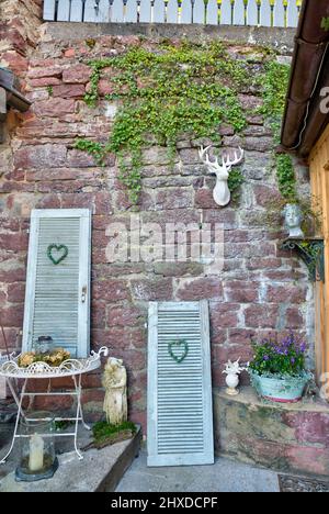 Photo reportage with text, Obere Gasse No 7, homestory, house facade, stone wall, old shutters, decoration, Rothenfels, Main Spessart, Franconia, Bavaria, Germany, Europe Stock Photo