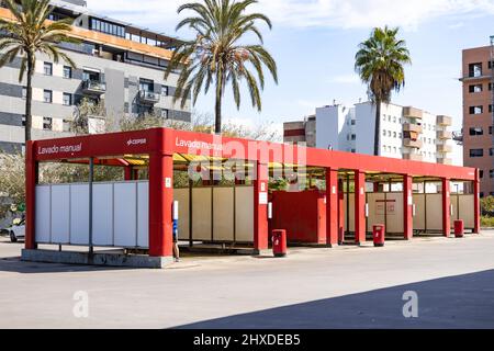 Huelva, Spain - March 10, 2022: Pressure car wash station at Cepsa service station Stock Photo