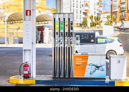 Huelva, Spain - March 10, 2022: View of a petrol pump at a gas Repsol station Stock Photo