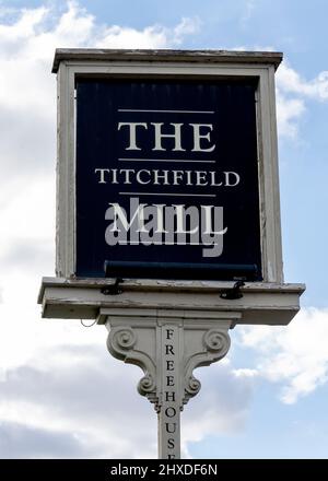 Traditional hanging pub sign at The Titchfield Mill public house, Mill Lane, Titchfield, Fareham, Hampshire, England, UK Stock Photo
