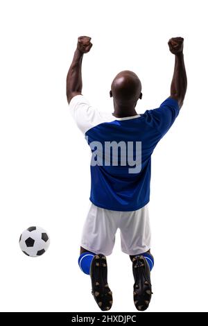 Excited male african american soccer athlete celebrating after scoring goal on white background Stock Photo