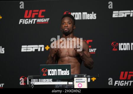 Las Vegas, USA. 11th Mar 2022. March 11, 2022, LAS VEGAS, LAS VEGAS, NV, United States: LAS VEGAS, NV - March 11: Sodiq Yusuff steps on the scale for the official weigh-in at the UFC Apex for UFC Vegas 50 - Santos vs Ankalaev - weigh-ins on March 11, 2022 in LAS VEGAS, United States. (Credit Image: © Louis Grasse/PX Imagens via ZUMA Press Wire) Credit: ZUMA Press, Inc./Alamy Live News Stock Photo