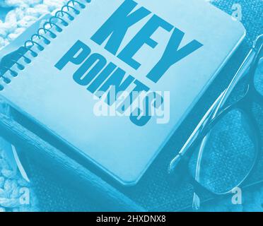 text KEY POINTs on the cover of a book, eye glasses and pen. Business education concept. Stock Photo